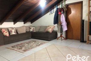 Casa em Condomínio à venda com 304m², 4 dormitórios, 1 suíte, 3 vagas, no bairro Vila Nova em Porto Alegre