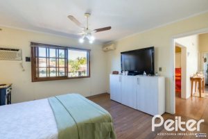 Casa à venda com 280m², 3 dormitórios, 1 suíte, 2 vagas, no bairro Jardim Isabel em Porto Alegre