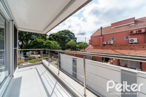 Casa em Condomínio à venda com 233m², 3 dormitórios, 3 suítes, 3 vagas, no bairro Vila Assunção em Porto Alegre