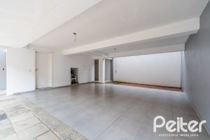 Casa em Condomínio à venda com 233m², 3 dormitórios, 3 suítes, 3 vagas, no bairro Vila Assunção em Porto Alegre