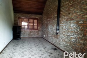 Casa à venda com 321m², 3 dormitórios, 1 suíte, 3 vagas, no bairro Espírito Santo em Porto Alegre