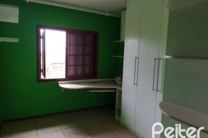 Casa à venda com 321m², 3 dormitórios, 1 suíte, 3 vagas, no bairro Espírito Santo em Porto Alegre