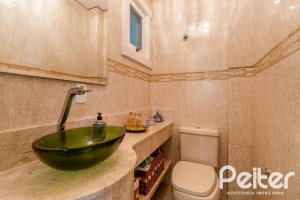 Casa em Condomínio à venda com 416m², 4 dormitórios, 4 suítes, 4 vagas, no bairro Terra Ville em PORTO ALEGRE