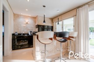 Casa em Condomínio à venda com 416m², 4 dormitórios, 4 suítes, 4 vagas, no bairro Terra Ville em PORTO ALEGRE