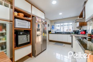 Casa em Condomínio à venda com 416m², 4 dormitórios, 4 suítes, 4 vagas, no bairro Terra Ville em PORTO ALEGRE