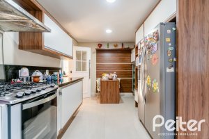 Casa em Condomínio à venda com 416m², 4 dormitórios, 4 suítes, 4 vagas, no bairro Terra Ville em PORTO ALEGRE