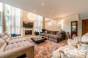 Casa em Condomínio à venda com 416m², 4 dormitórios, 4 suítes, 4 vagas, no bairro Terra Ville em PORTO ALEGRE