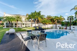 Casa em Condomínio à venda com 416m², 4 dormitórios, 4 suítes, 4 vagas, no bairro Terra Ville em PORTO ALEGRE