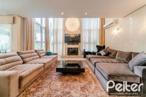 Casa em Condomínio à venda com 416m², 4 dormitórios, 4 suítes, 4 vagas, no bairro Terra Ville em PORTO ALEGRE