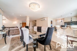 Casa em Condomínio à venda com 416m², 4 dormitórios, 4 suítes, 4 vagas, no bairro Terra Ville em PORTO ALEGRE
