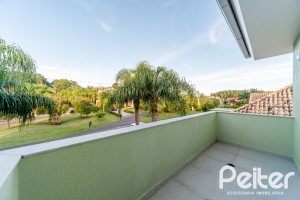 Casa em Condomínio à venda com 416m², 4 dormitórios, 4 suítes, 4 vagas, no bairro Terra Ville em PORTO ALEGRE