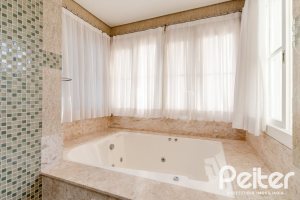 Casa em Condomínio à venda com 416m², 4 dormitórios, 4 suítes, 4 vagas, no bairro Terra Ville em PORTO ALEGRE