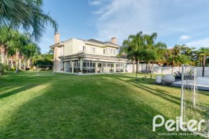 Casa em Condomínio à venda com 416m², 4 dormitórios, 4 suítes, 4 vagas, no bairro Terra Ville em PORTO ALEGRE