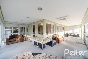 Casa em Condomínio à venda com 416m², 4 dormitórios, 4 suítes, 4 vagas, no bairro Terra Ville em PORTO ALEGRE