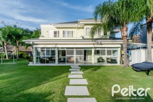 Casa em Condomínio à venda com 416m², 4 dormitórios, 4 suítes, 4 vagas, no bairro Terra Ville em PORTO ALEGRE