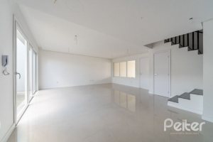 Casa em Condomínio à venda com 306m², 3 dormitórios, 3 suítes, 3 vagas, no bairro Vila Assunção em Porto Alegre