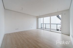 Casa em Condomínio à venda com 306m², 3 dormitórios, 3 suítes, 3 vagas, no bairro Vila Assunção em Porto Alegre