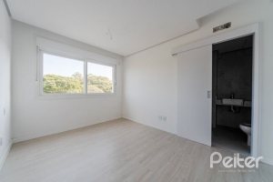 Casa em Condomínio à venda com 306m², 3 dormitórios, 3 suítes, 3 vagas, no bairro Vila Assunção em Porto Alegre