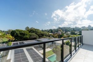 Casa em Condomínio à venda com 306m², 3 dormitórios, 3 suítes, 3 vagas, no bairro Vila Assunção em Porto Alegre