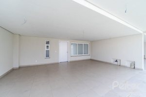 Casa em Condomínio à venda com 306m², 3 dormitórios, 3 suítes, 3 vagas, no bairro Vila Assunção em Porto Alegre