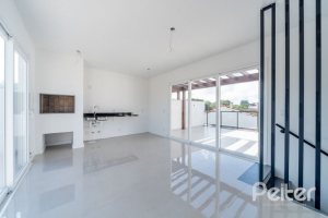 Casa em Condomínio à venda com 306m², 3 dormitórios, 3 suítes, 3 vagas, no bairro Vila Assunção em Porto Alegre