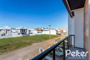 Casa em Condomínio à venda com 164m², 3 dormitórios, 1 suíte, 2 vagas, no bairro Hípica em PORTO ALEGRE