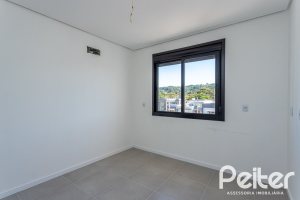 Casa em Condomínio à venda com 164m², 3 dormitórios, 1 suíte, 2 vagas, no bairro Hípica em PORTO ALEGRE