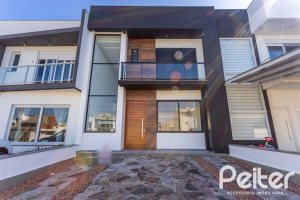Casa em Condomínio à venda com 164m², 3 dormitórios, 1 suíte, 2 vagas, no bairro Hípica em PORTO ALEGRE