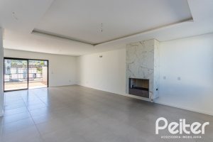 Casa em Condomínio à venda com 164m², 3 dormitórios, 1 suíte, 2 vagas, no bairro Hípica em PORTO ALEGRE