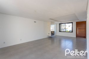 Casa em Condomínio à venda com 164m², 3 dormitórios, 1 suíte, 2 vagas, no bairro Hípica em PORTO ALEGRE