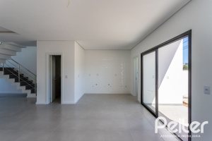 Casa em Condomínio à venda com 164m², 3 dormitórios, 1 suíte, 2 vagas, no bairro Hípica em PORTO ALEGRE