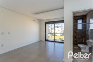 Casa em Condomínio à venda com 164m², 3 dormitórios, 1 suíte, 2 vagas, no bairro Hípica em PORTO ALEGRE