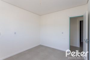 Casa em Condomínio à venda com 164m², 3 dormitórios, 1 suíte, 2 vagas, no bairro Hípica em PORTO ALEGRE