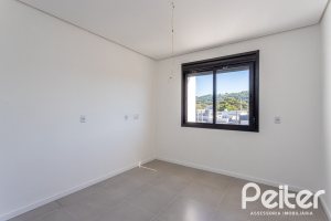 Casa em Condomínio à venda com 164m², 3 dormitórios, 1 suíte, 2 vagas, no bairro Hípica em PORTO ALEGRE