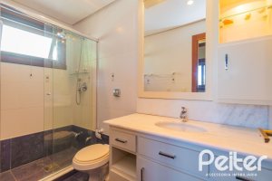 Casa em Condomínio à venda com 600m², 4 dormitórios, 4 suítes, 4 vagas, no bairro Terra Ville em PORTO ALEGRE