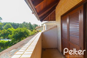 Casa em Condomínio à venda com 600m², 4 dormitórios, 4 suítes, 4 vagas, no bairro Terra Ville em PORTO ALEGRE