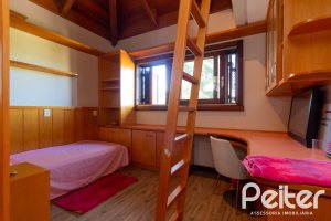 Casa em Condomínio à venda com 600m², 4 dormitórios, 4 suítes, 4 vagas, no bairro Terra Ville em PORTO ALEGRE