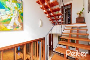 Casa em Condomínio à venda com 600m², 4 dormitórios, 4 suítes, 4 vagas, no bairro Terra Ville em PORTO ALEGRE