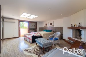 Casa em Condomínio à venda com 600m², 4 dormitórios, 4 suítes, 4 vagas, no bairro Terra Ville em PORTO ALEGRE