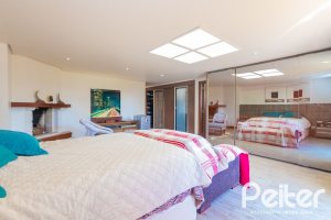 Casa em Condomínio à venda com 600m², 4 dormitórios, 4 suítes, 4 vagas, no bairro Terra Ville em PORTO ALEGRE