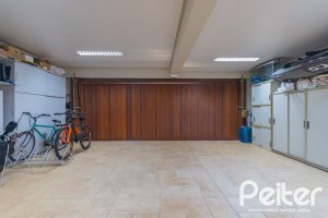 Casa em Condomínio à venda com 600m², 4 dormitórios, 4 suítes, 4 vagas, no bairro Terra Ville em PORTO ALEGRE