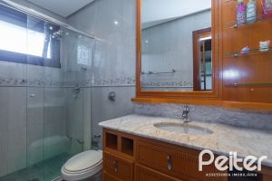 Casa em Condomínio à venda com 600m², 4 dormitórios, 4 suítes, 4 vagas, no bairro Terra Ville em PORTO ALEGRE