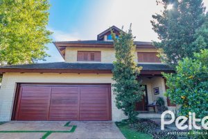 Casa em Condomínio à venda com 600m², 4 dormitórios, 4 suítes, 4 vagas, no bairro Terra Ville em PORTO ALEGRE