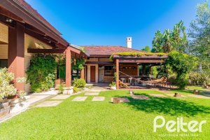 Casa em Condomínio à venda com 600m², 4 dormitórios, 4 suítes, 4 vagas, no bairro Terra Ville em PORTO ALEGRE