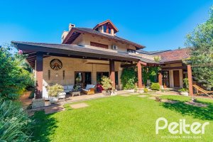 Casa em Condomínio à venda com 600m², 4 dormitórios, 4 suítes, 4 vagas, no bairro Terra Ville em PORTO ALEGRE