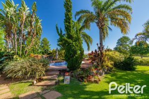 Casa em Condomínio à venda com 600m², 4 dormitórios, 4 suítes, 4 vagas, no bairro Terra Ville em PORTO ALEGRE