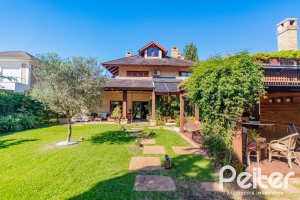 Casa em Condomínio à venda com 600m², 4 dormitórios, 4 suítes, 4 vagas, no bairro Terra Ville em PORTO ALEGRE