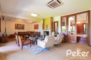 Casa em Condomínio à venda com 600m², 4 dormitórios, 4 suítes, 4 vagas, no bairro Terra Ville em PORTO ALEGRE