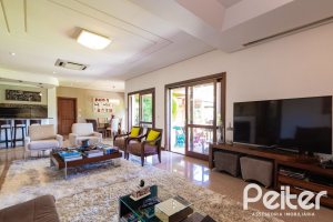 Casa em Condomínio à venda com 600m², 4 dormitórios, 4 suítes, 4 vagas, no bairro Terra Ville em PORTO ALEGRE