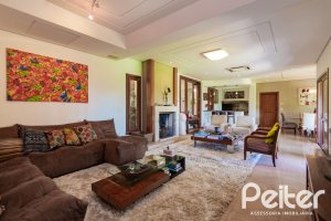 Casa em Condomínio à venda com 600m², 4 dormitórios, 4 suítes, 4 vagas, no bairro Terra Ville em PORTO ALEGRE